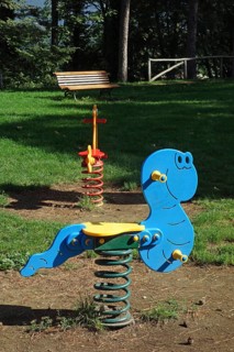 Feather teeter-totter on a playground in Arezzo Italy