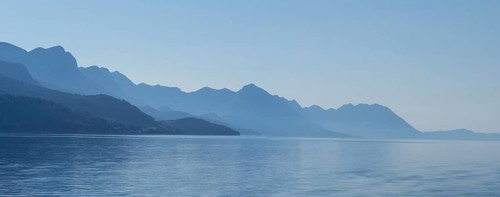 Mountain range by the sea in the morning light, panoramic shot, Makarska Riviera, near Makarska,