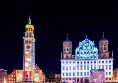 AUGSBURG, GERMANY - OCTOBER 24: Illuminated historic buildings (town hall and perlach tower) at the