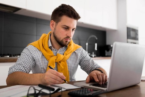 Portrait adult male working from home