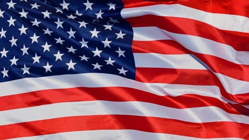 Close-up of a waving flag, national flag of the USA, fabric looks like silk