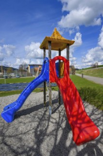 Children's slide at the pond in WiWaLaMoor, Wildpoldsried, Allgäu, Swabia, Bavaria, Germany, Europe