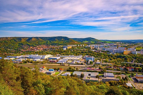 View over Jena Lobeda with the A4 motorway from the Mönchsberg quarry in autumn with veil clouds,