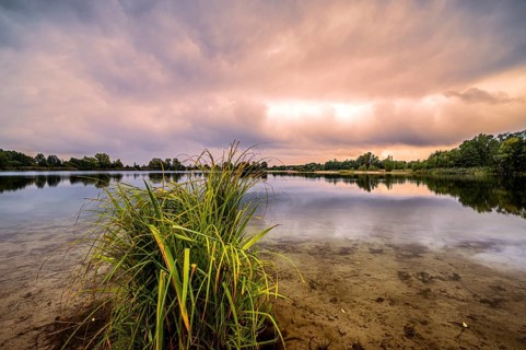 The Hufeisensee in Isernhagen near Hanover in autumn during rain and sunset, Isernhagen, Lower