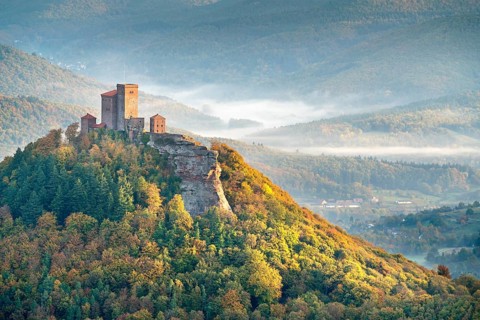 Trifels Castle in the morning light with wafts of mist in the valley, autumn, Annweiler at Trifels,