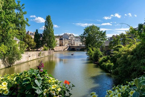 Metz, France - 1 June, 2022: view of the Moselle River and the historic city center of Metz