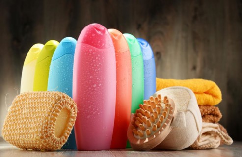 Plastic bottles of body care and beauty products