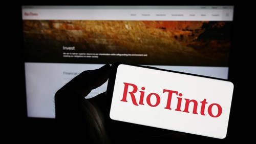 Stuttgart, Germany, 07-27-2023: Person holding smartphone with logo of mining company Rio Tinto