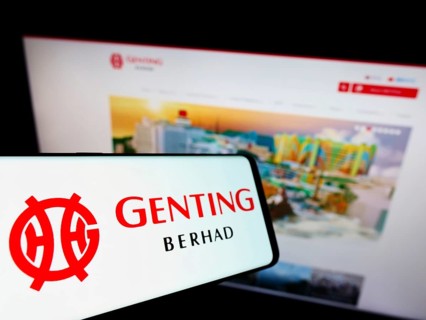 Stuttgart, Germany, 01-15-2022: Mobile phone with logo of Malaysian conglomerate Genting Group on