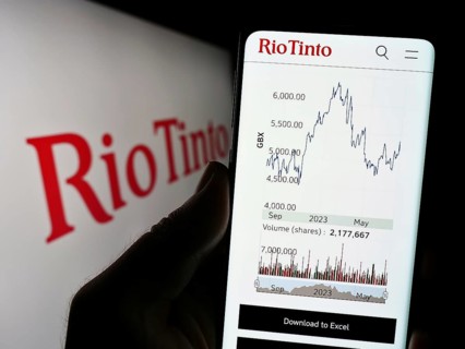 Stuttgart, Germany, 07-27-2023: Person holding cellphone with webpage of mining company Rio Tinto
