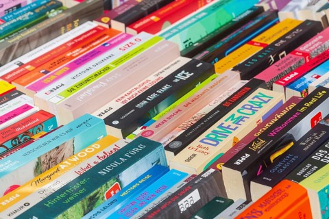 Colourful paperbacks on a bookshop stall, Germany, Europe