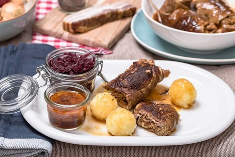 Home-style beef roulade with red cabbage and potato dumplings