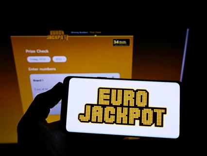 Stuttgart, Germany, 01-08-2022: Person holding mobile phone with logo of transnational European