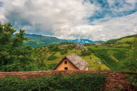 Panoramic view from Prösels Castle of the village of Fiè allo Sciliar (Völs am Schlern) in the