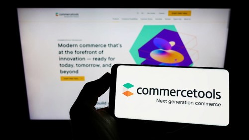 Stuttgart, Germany, 03-30-2022: Person holding cellphone with logo of German e-commerce company