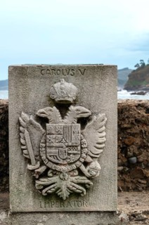 Memorial stone with the coat of arms of Emperor Charles V, commemorating his landing in Tazones on