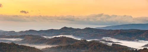 Autumn View panorama South Styrian wine route in Austria at hills in Slovenia during sunraise.