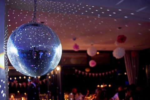 Nightclub disco ball with colorful reflections