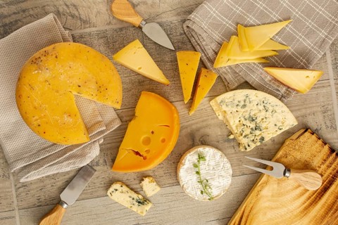 Top view variety delicious cheese. Beautiful photo