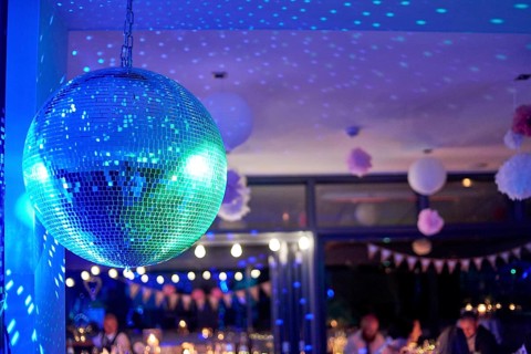 Nightclub disco ball with colorful reflections