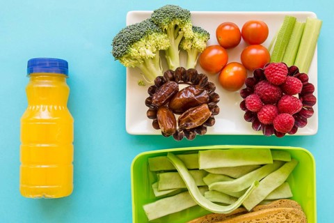 Juice near healthy food lunchbox