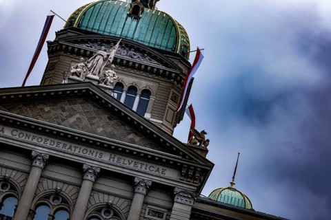 Beautiful Bundeshaus Parliament Building or Federal Palace with Storm Clouds in City of Bern,