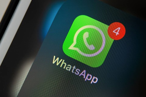 Calgary, Alberta. Canada Dec 12, 2019. Close up of the WhatsApp app. WhatsApp dark mode secretly