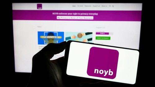 Stuttgart, Germany, 07-31-2023: Person holding mobile phone with logo of NOYB ? European Center for
