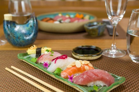 Platter with different types of nigirizushi, nigiri with different fish and one decorated with a