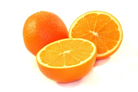 Orange halves on a white background