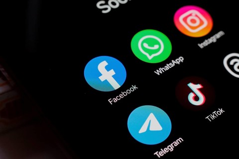 In this photo illustration, WhatsApp, Facebook, Instagram, Telegram, TikTok and Threads apps