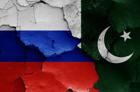 Flags of Russia and Pakistan painted on cracked wall