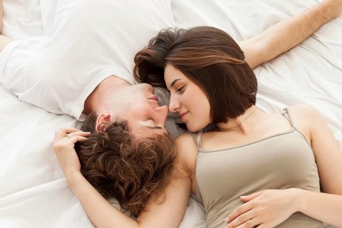 Flat lay couple laying bed