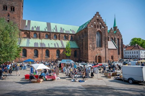 Flea market, art market in the front of the Aarhus Cathedral with lots of different stalls,
