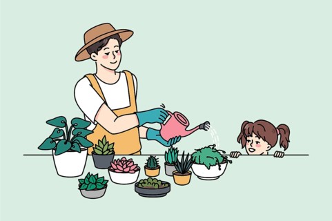 Young father gardener with small daughter enjoy watering plants at home. Smiling dad and little