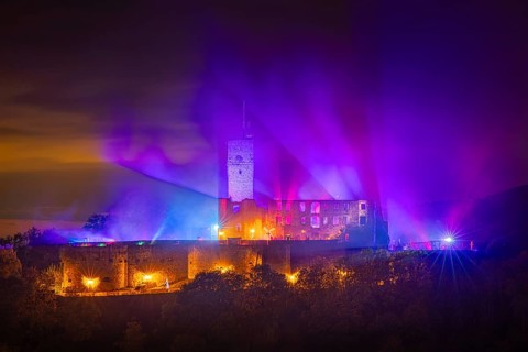 The castle in the town of Königstein im Taunus is brightly illuminated in the evening. From 18