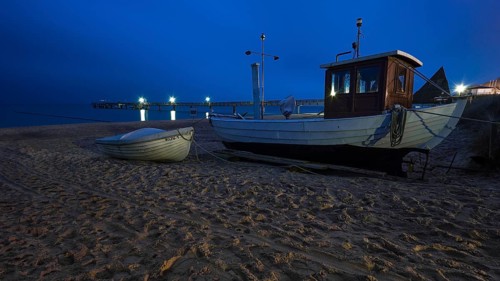 Fishing boats on the beach of Koserow with a long exposure taken in the evening