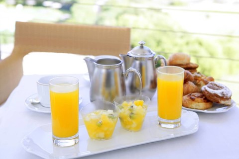 Breakfast with orange juice coffe milk and tea bakery