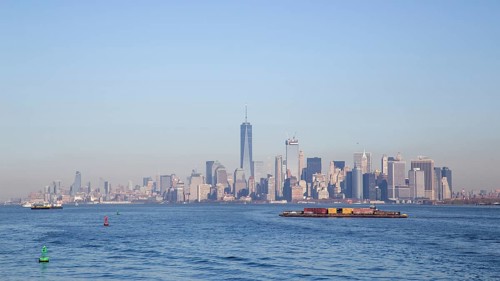 New York, United States of America, November 18, 2016: A container ship in front of the Lower