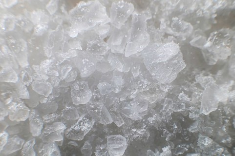 Macro view of crystals of table salt. Taste useful additive saline solutions background in shallow