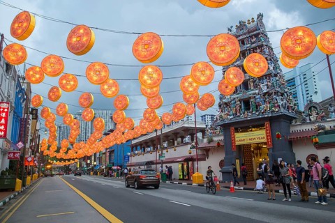 Singapore, Singapore, February 2, 2015: People on a street decorated for upcoming Chinese New Year