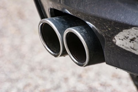 Closeup of an exhaust pipe of a car