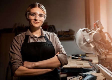 Front view female carpenter posing work