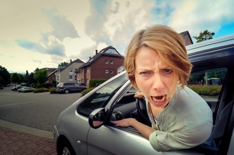 Aggressive driver screams out of the window