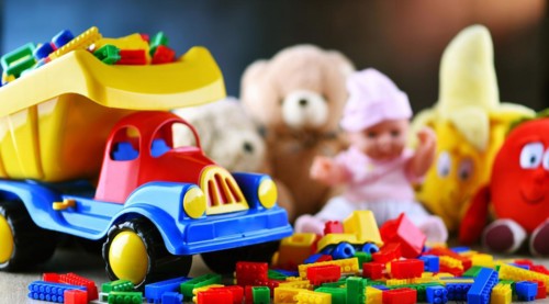 Colorful plastic and plush toys in a children's room