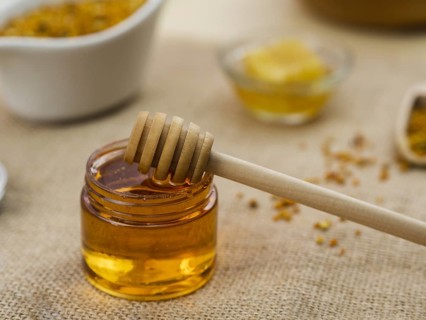 Wooden dipper sticky honey. Resolution and high quality beautiful photo