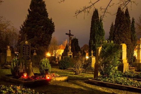 SCHROBENHAUSEN, GERMANY - DECEMBER 24: Night at an old historic graveyard in Schrobenhausen,