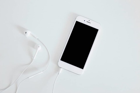 Smartphone with earphone isolated white background. Resolution and high quality beautiful photo