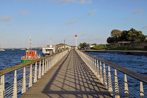 Pier with boats at the jetty, Le Croisic, Loire-Atlantique, Pays de la Loire, France, Europe