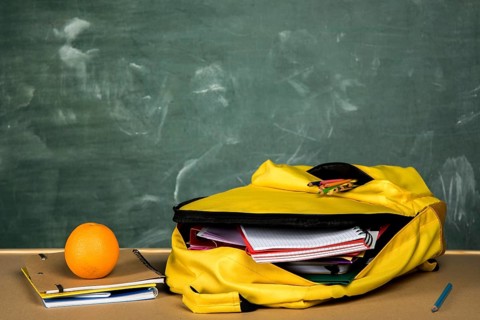 Open backpack orange table